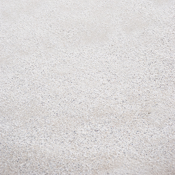Bright white masonry sand swatch, close-up